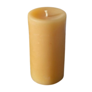 A solid beeswax pillar candle, 4.5cm wide and 9cm tall
