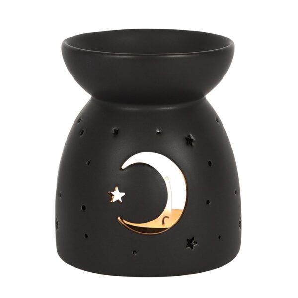Black ceramic oil burner with a golden crescent moon and star cutouts.